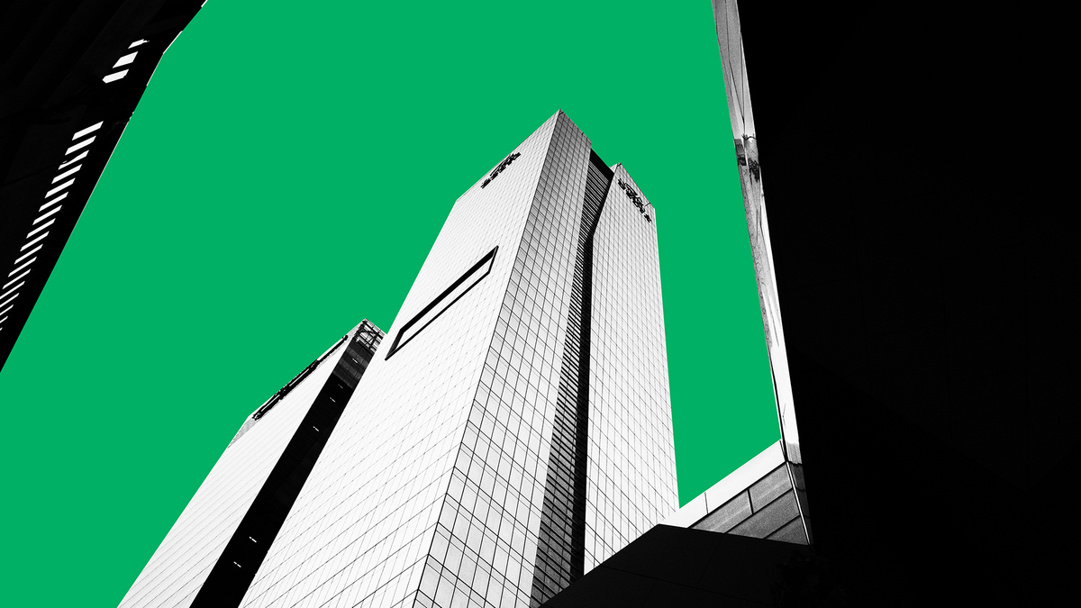 photocomposition: a building in black and white in front of a green background