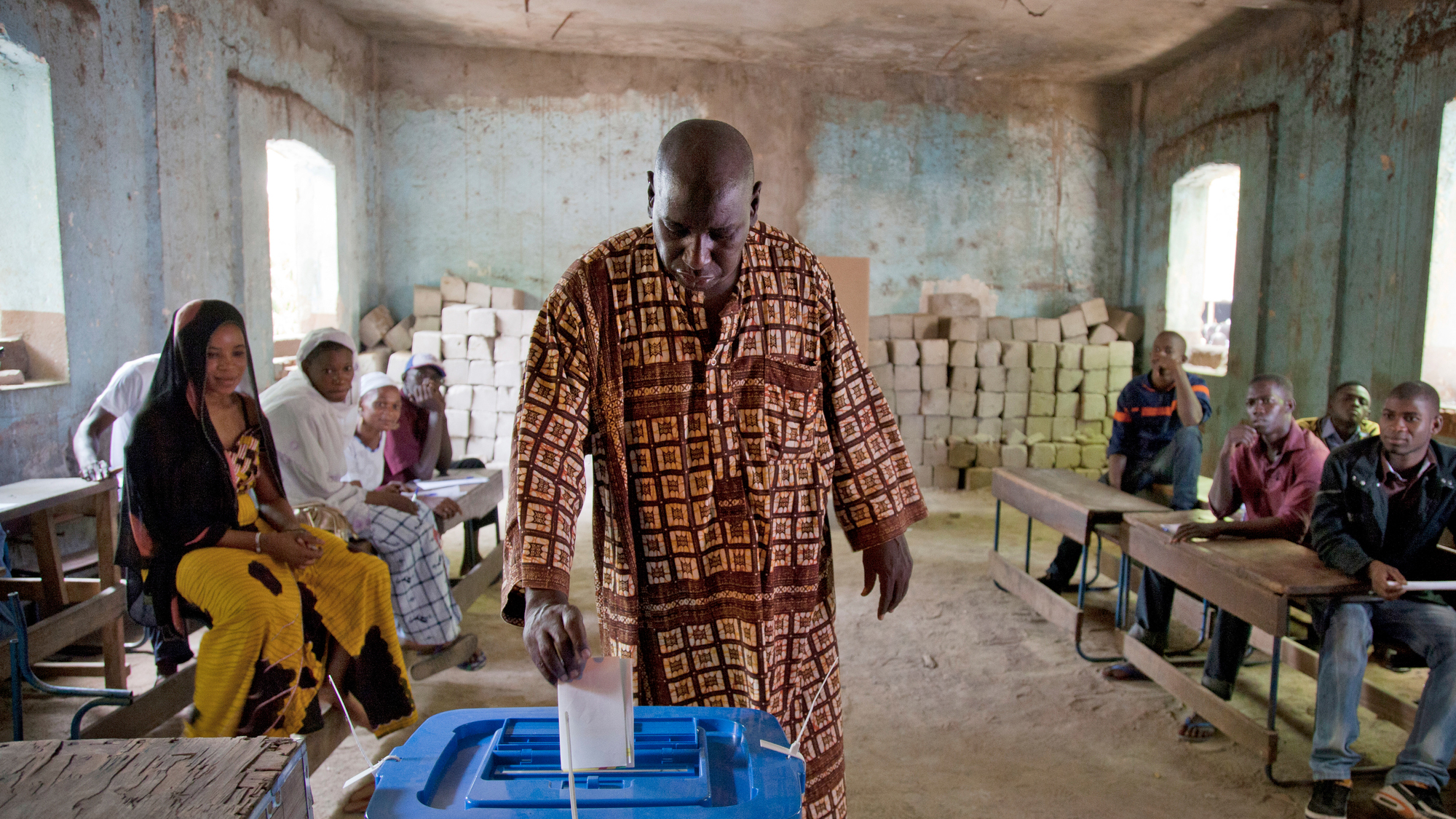 A man voting at a polling station in Mali in 2013.