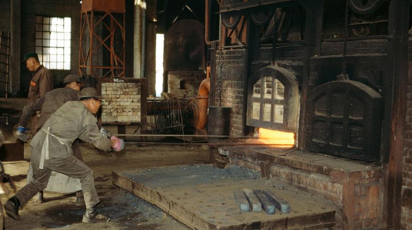 Men working in the forging shop