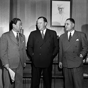 Secretary-General Trygve Lie at left, Victor Chi-Tsai Hoo at center, Ralph Bunche at right, in historical UN photo.